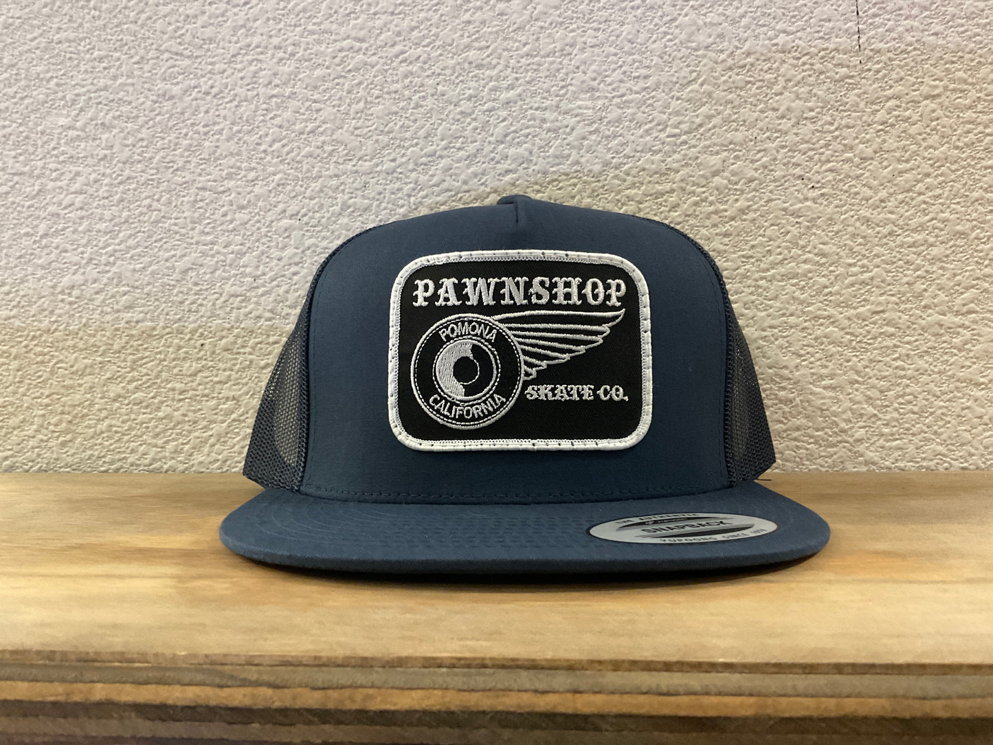 Pawnshop Pomona Wing & Wheel Patch Trucker