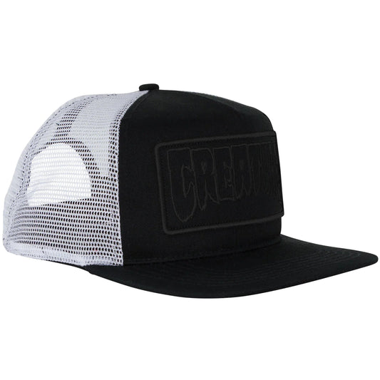 Creature patch trucker hat